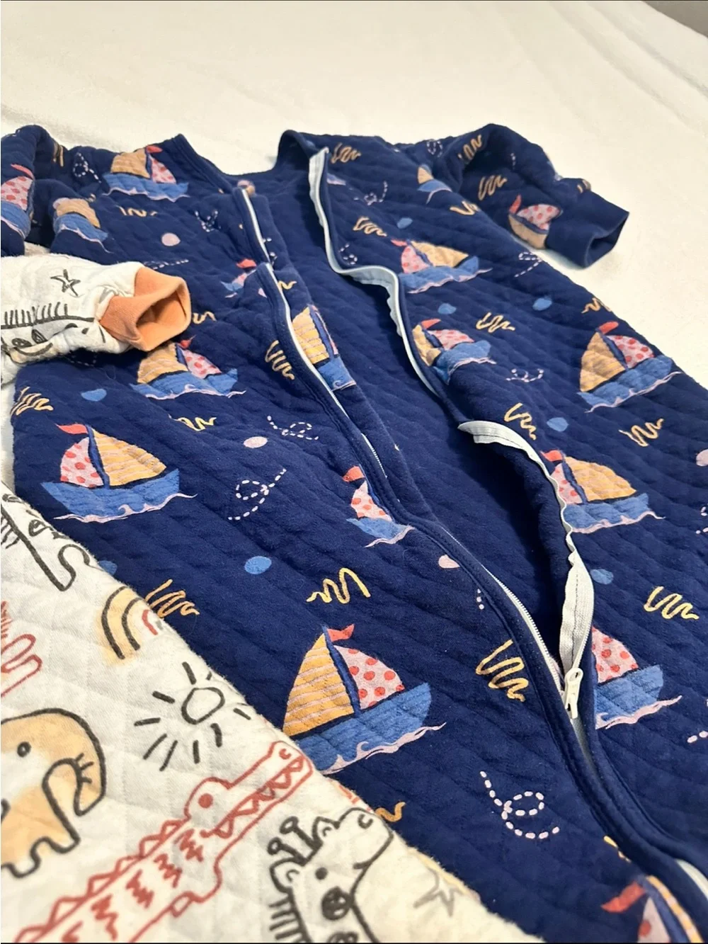 A lot of 6 infant sleep sacks